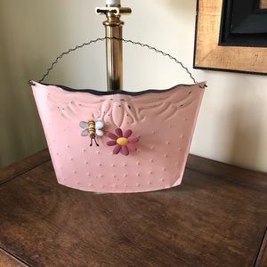 Adorable peach wall pocket.